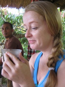 Krista looking slightly skeptical prior to tasting the kopi luwak